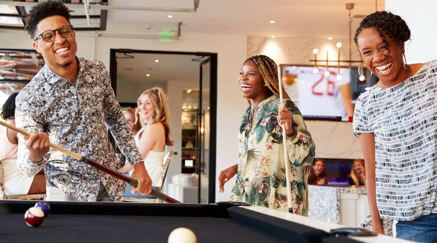 friends playing pool