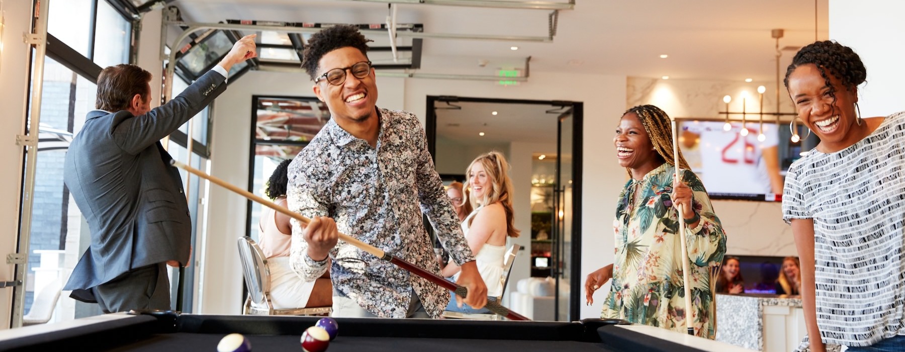 people playing pool