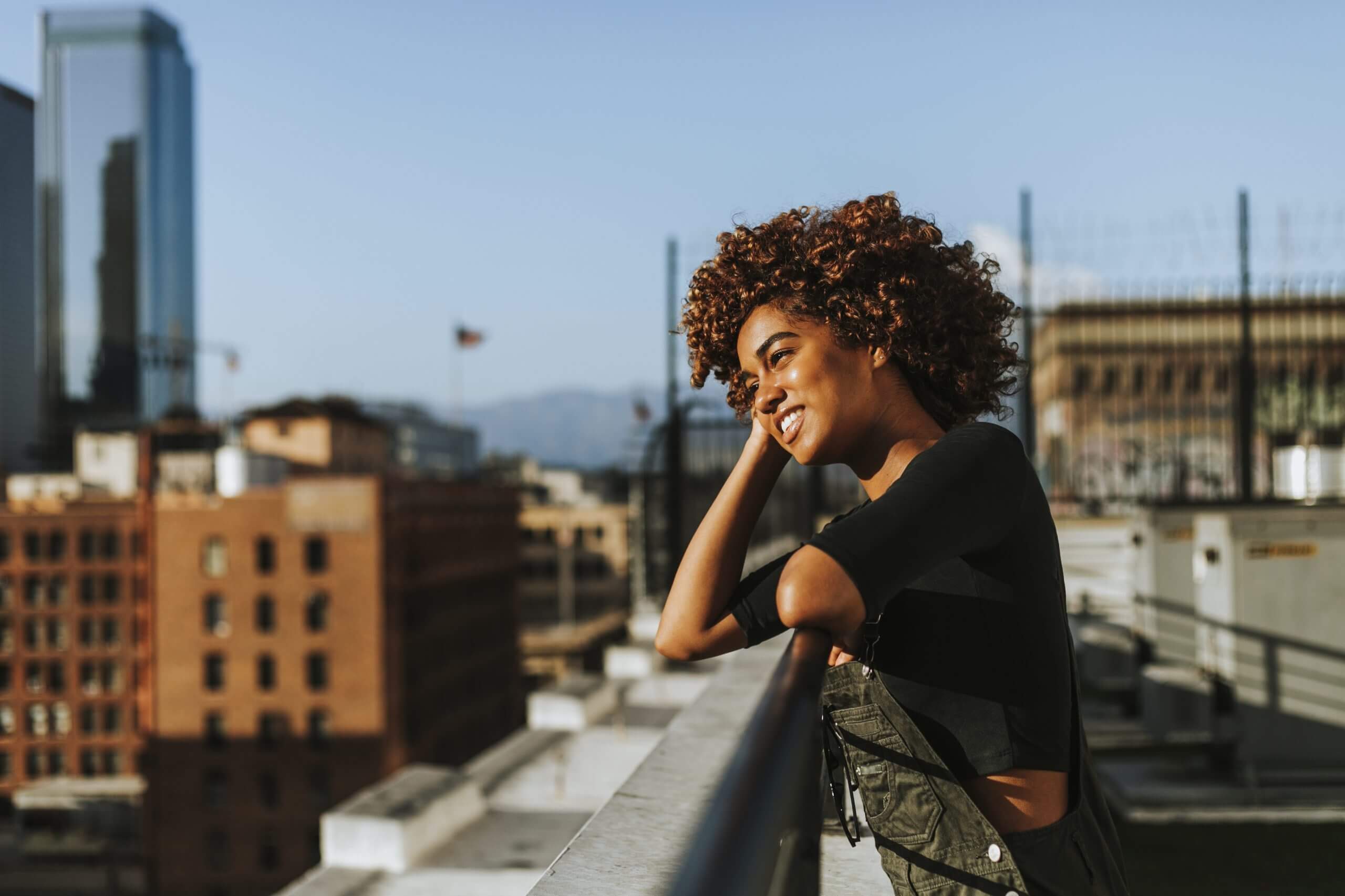 Girl standing on balcony